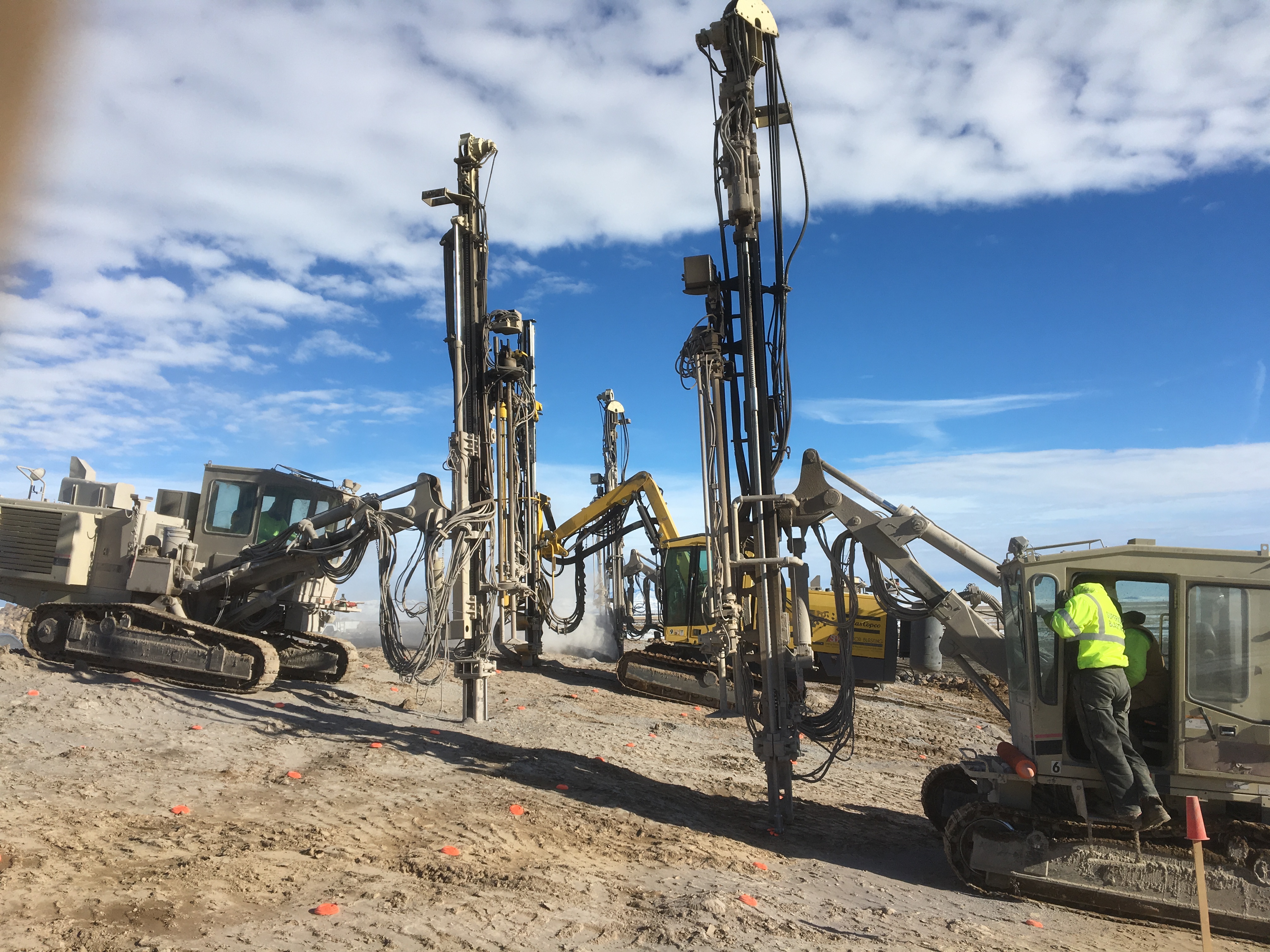 Field equipment and drilling machinery at an active worksite.